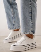ballada Pantofi sport pe talpă groasă cu linie clasică din imitație de piele Neurata Albi