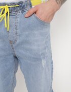  Blugi Albaștri cu talie elastică cu elastic la glezne și cu mici rupturi Vernis