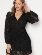 retro & icone Rochie neagră de dantelă cu decolteu petrecut și drapaje Labisse