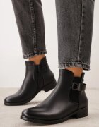 super mode Botine cu talpă joasă (tip chelsea) decorate cu dungă și cataramă Rosint Negre