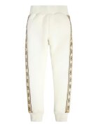 GUESS KIDS Pantaloni de trening cu segmente logo laterale - Maro nisip/Bej deschis