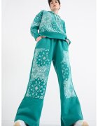 Puma Pantaloni de trening cu croiala ampla si model Shooting Stars - Alb/Verde