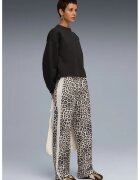 Puma Pantaloni de trening cu croiala relaxed-fit T7 Leo Luxe