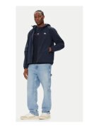 Tommy Jeans Jacheta de vant barbati - bleumarin - 100% nailon reciclat
