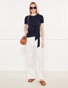 Tommy Hilfiger Pantaloni | flare fit | cu adaos de in