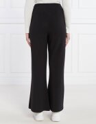 Tommy Jeans Pantaloni de trening BADGE WIDE EXT | flare fit