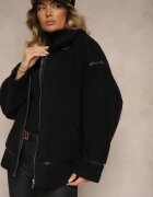 ann gissy Jachetă de blană neagră cu croi oversize cu guler înalt și curea și cataramă Toriara
