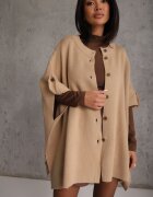 bisou's project Poncho oversize din tricot cu mânecă scurtă închis cu nasturi Obsidis Bej