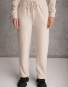defox Compleu de trening Bej din polar Bluză cu fermoar scurt și Pantaloni jogger Hypamena
