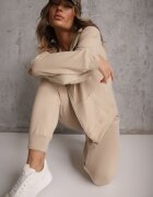 defox Compleu de trening bej Pantaloni jogger și bluză cu glugă cu fermoar Bernika