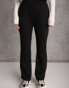 defox Pantaloni de trening Negri Flare cu elastic în talie Efranaria