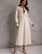 fashion station Fustă midi Bej deschis Cloche cu croială clasică Namettia