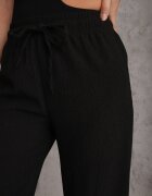 glo-story Pantaloni Pirethei Negri