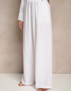 jumelle Compleu de costum Alb Sacou cu buzunare și Pantaloni largi Tasvanis