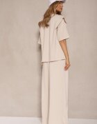jumelle Set Bej deschis din Viscoză Tricou cu Decolteu în V și Pantaloni cu croială largă Zevline