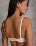 love magnolia Sutien din dantelă bej deschis ornat cu fundiță Falzedia