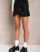 new collection Fustă neagră mini petrecută cu nod decorativ Daevy