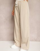 retro & icone Pantaloni din material textil bej deschis cu picioare largi talie înaltă cu elastic în talie Comina