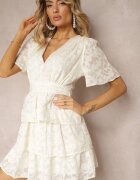 retro & icone Rochie bej deschis cu croi evazat cu decolteu în V și volane Drapia