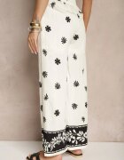 sophyline paris Pantaloni Bej deschis din viscoză cu croială largă cu elastic în talie cu imprimeu floral Nimilassa
