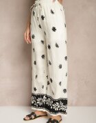 sophyline paris Pantaloni Bej deschis din viscoză cu croială largă cu elastic în talie cu imprimeu floral Nimilassa
