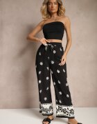 sophyline paris Pantaloni negri din vâscoză cu croială largă cu elastic în talie cu imprimeu floral Nimilassa