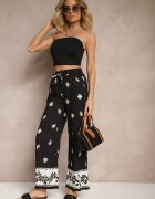 sophyline paris Pantaloni negri din vâscoză cu croială largă cu elastic în talie cu imprimeu floral Nimilassa