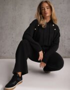 swest Set trening pantaloni Wide Leg și bluză cu glugă și aplicații Nailena Negru