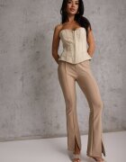 yu & me Pantaloni clopot textili Bej cu lanț decorativ Amelana