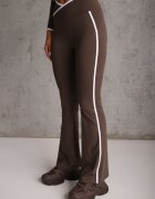 yu & me Set fitness: pantaloni flare hanorac și top cu paspoal decorativ Quintela Maro