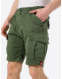 ALPHA INDUSTRIES Pantaloni cu buzunare 'Airman' verde închis - Pled.ro