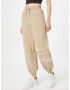 Calvin Klein Jeans Pantaloni bej / alb - Pled.ro