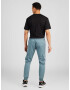 Calvin Klein Jeans Pantaloni cu buzunare albastru fumuriu - Pled.ro