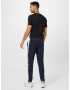 Champion Authentic Athletic Apparel Pantaloni bleumarin / alb - Pled.ro