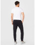 Champion Authentic Athletic Apparel Pantaloni roșu / negru / alb - Pled.ro