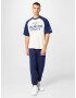 Champion Authentic Athletic Apparel Tricou 'Legacy' bleumarin / alb natural - Pled.ro