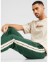 ELLESSE Pantaloni 'Luxor' verde iarbă / negru / alb - Pled.ro