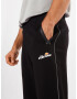 ELLESSE Pantaloni sport 'Diruta' portocaliu deschis / roșu / negru / alb - Pled.ro