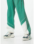 ELLESSE Pantaloni 'Talian' verde / alb - Pled.ro