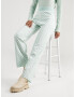 florence by mills exclusive for ABOUT YOU Pantaloni 'Copal' verde pastel / alb - Pled.ro