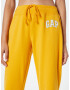 GAP Pantaloni galben auriu / alb - Pled.ro