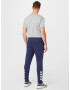 Hummel Pantaloni sport bleumarin / alb - Pled.ro