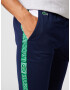 Lacoste Sport Pantaloni sport albastru noapte / verde iarbă / roșu / alb - Pled.ro