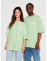 Multiply Apparel Tricou 'Banderole' verde pastel / negru / alb - Pled.ro