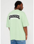 Multiply Apparel Tricou 'Banderole' verde pastel / negru / alb - Pled.ro