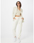 Nasty Gal Pantaloni cu buzunare crem - Pled.ro