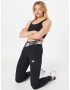 new balance Pantaloni sport negru / alb - Pled.ro