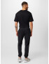 new balance Pantaloni negru / alb - Pled.ro