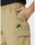 Nike Sportswear Pantaloni cu buzunare maro deschis / negru - Pled.ro