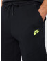 Nike Sportswear Pantaloni galben neon / negru - Pled.ro